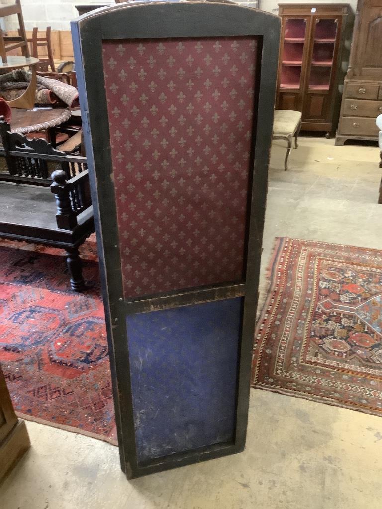 A Spanish leather folding six panel draught screen, with embossed floral printed card panels, height 168cm
